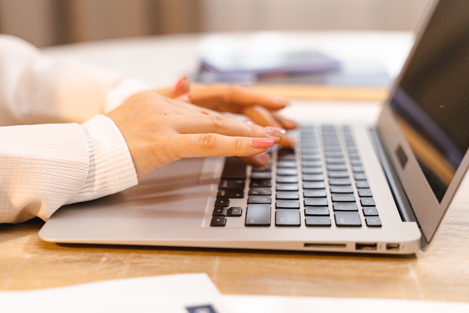 laptop typing work - Photo by ANTONI SHKRABA production on Pexels